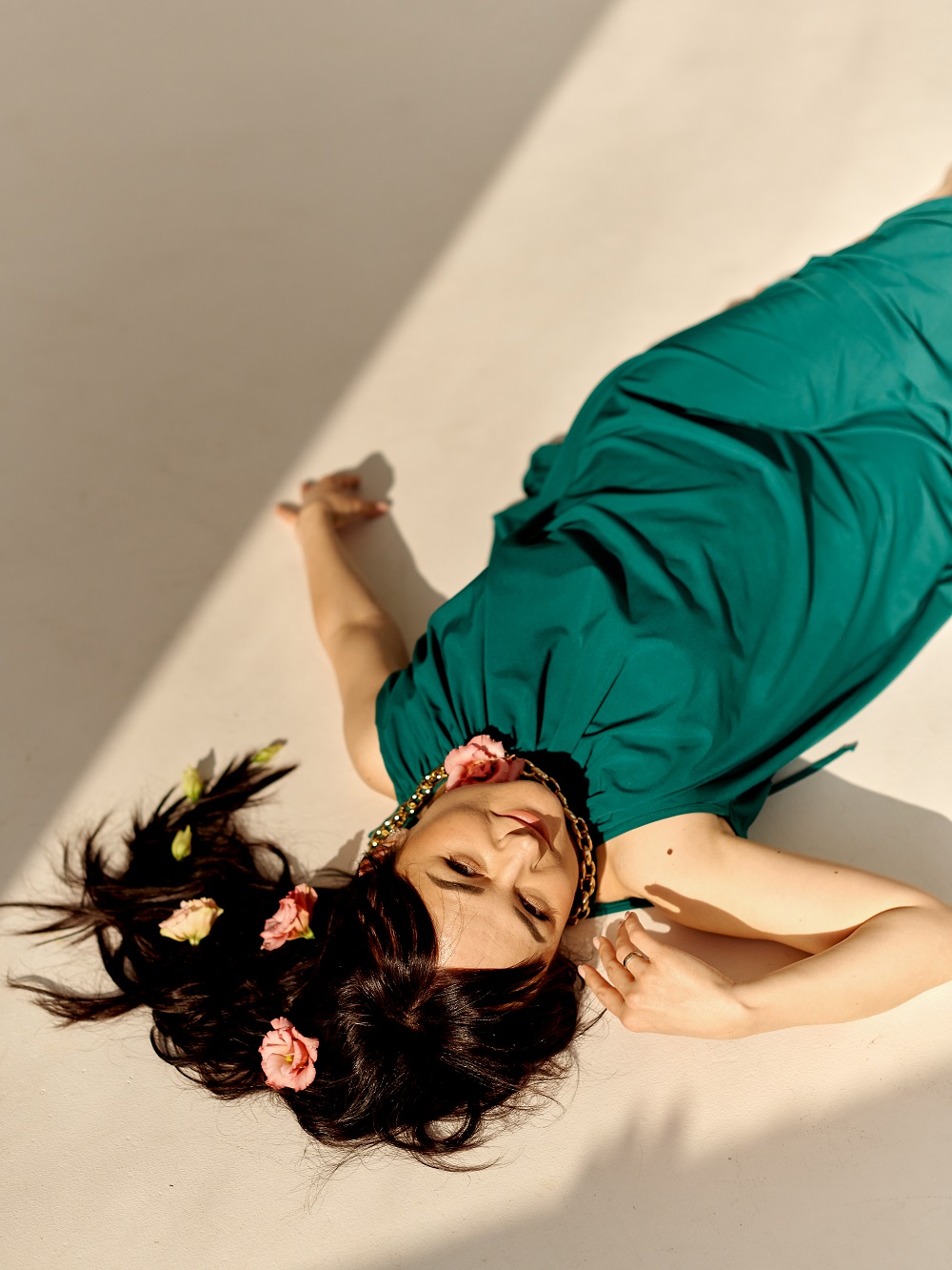 Green maxi dress with a drawstring around the neck